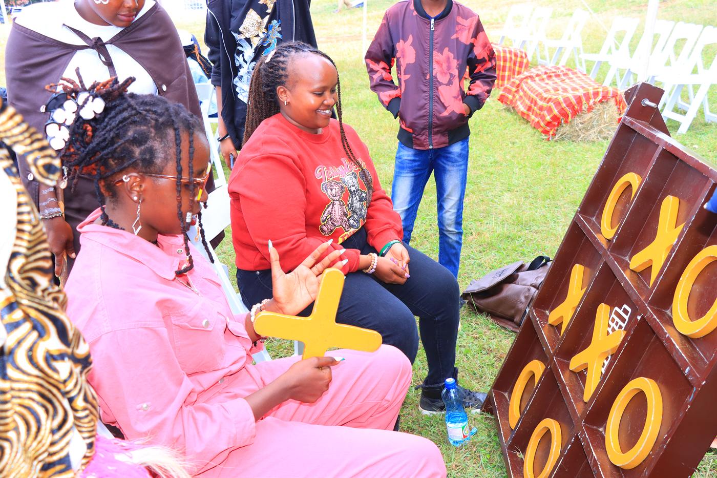 Festival-goers playing a large outdoor game