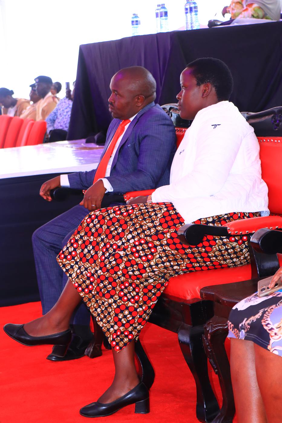 Guests seated in the front row at the festival