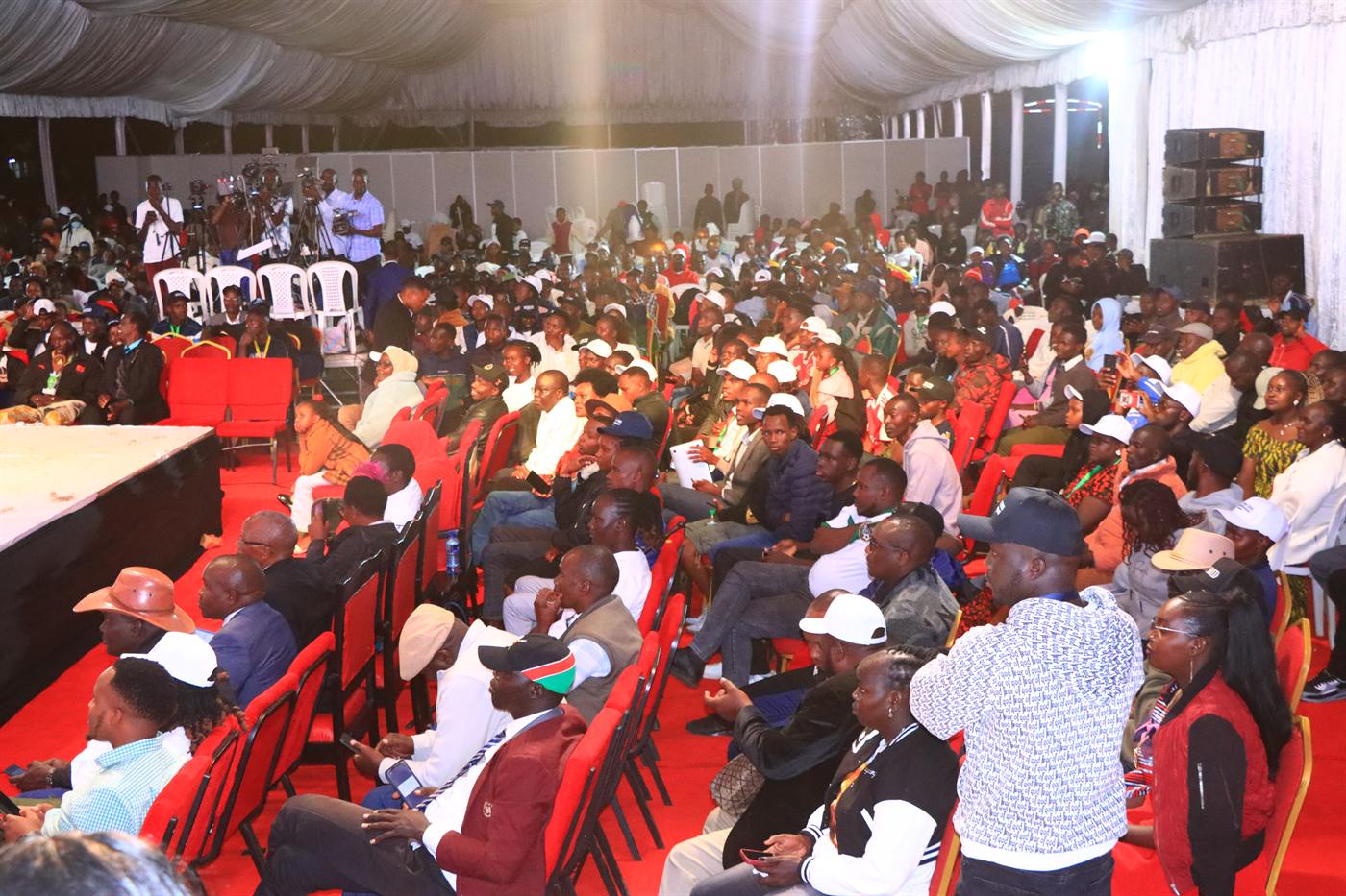 A packed crowd watching the evening programme